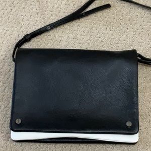 halogen leather 9x7 cross body bag. Adjustable strap